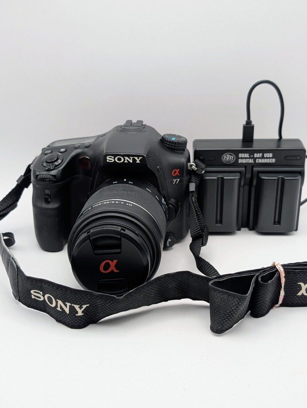 Sony Alpha A77 SLT-A77V 24.3MP + DT 4-5.6/55-200 SAM Lens + 3 Batteries Charger